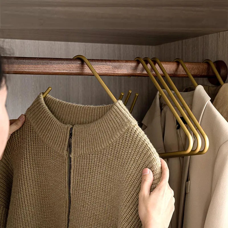 Triangular Space-Saving Hangers